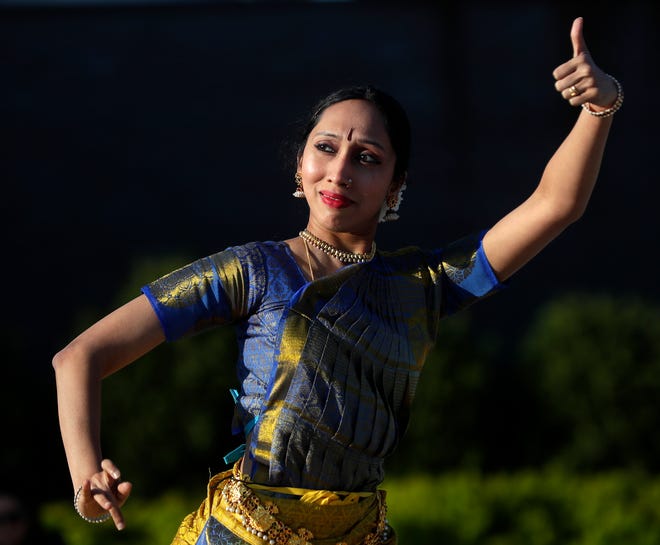AUM Performing Arts performs for the audience during an Asian American, Pacific Islander heritage celebration at Green Bay Packers' Titletown District on May 15, 2024, in Ashwaubenon, Wis.
