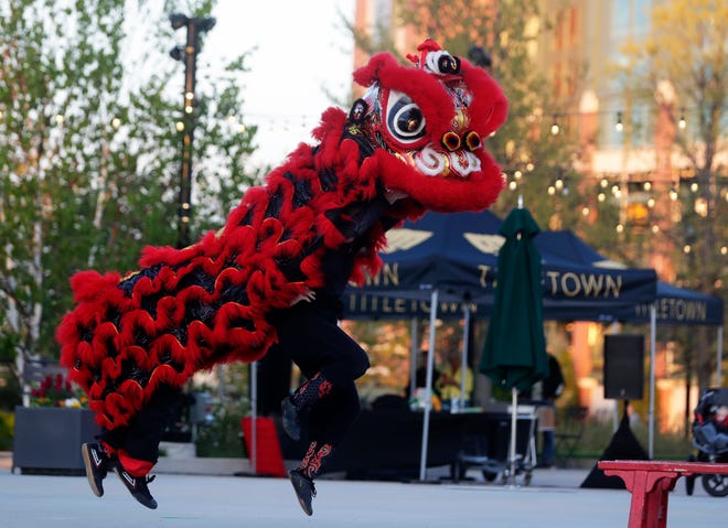 Dancers from Zhong Yi Kung Fu Association perform for the audience during an Asian American, Pacific Islander heritage celebration at Green Bay Packers' Titletown District on May 15, 2024, in Ashwaubenon, Wis.