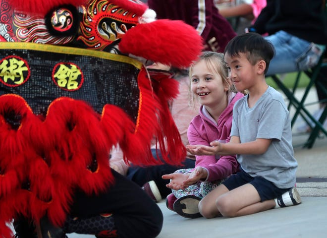 Dancers from Zhong Yi Kung Fu Association perform for the audience during an Asian American, Pacific Islander heritage celebration at Green Bay Packers' Titletown District on May 15, 2024, in Ashwaubenon, Wis.