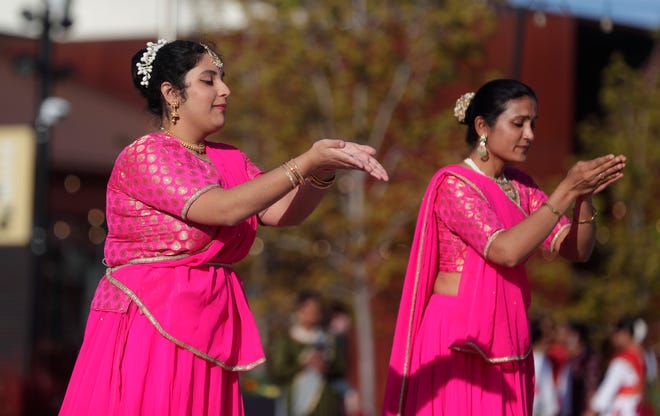 Dancers from Aarambh Kathak Dance School perform for the audience during an Asian American, Pacific Islander heritage celebration at Green Bay Packers' Titletown District on May 15, 2024, in Ashwaubenon, Wis.