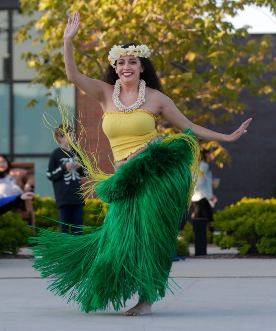 Nā Hale Studios performs for the audience during an Asian American, Pacific Islander heritage celebration at Green Bay Packers' Titletown District on May 15, 2024, in Ashwaubenon, Wis.