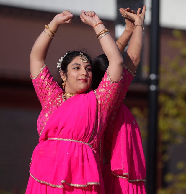 Dancers from Aarambh Kathak Dance School perform for the audience during an Asian American, Pacific Islander heritage celebration at Green Bay Packers' Titletown District on May 15, 2024, in Ashwaubenon, Wis.
