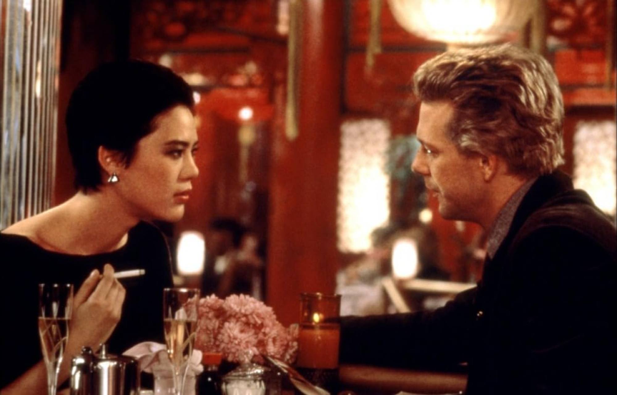 Ariane as reporter Tracy Tzu and Rourke as Captain Whilte in a still from Year of the Dragon.