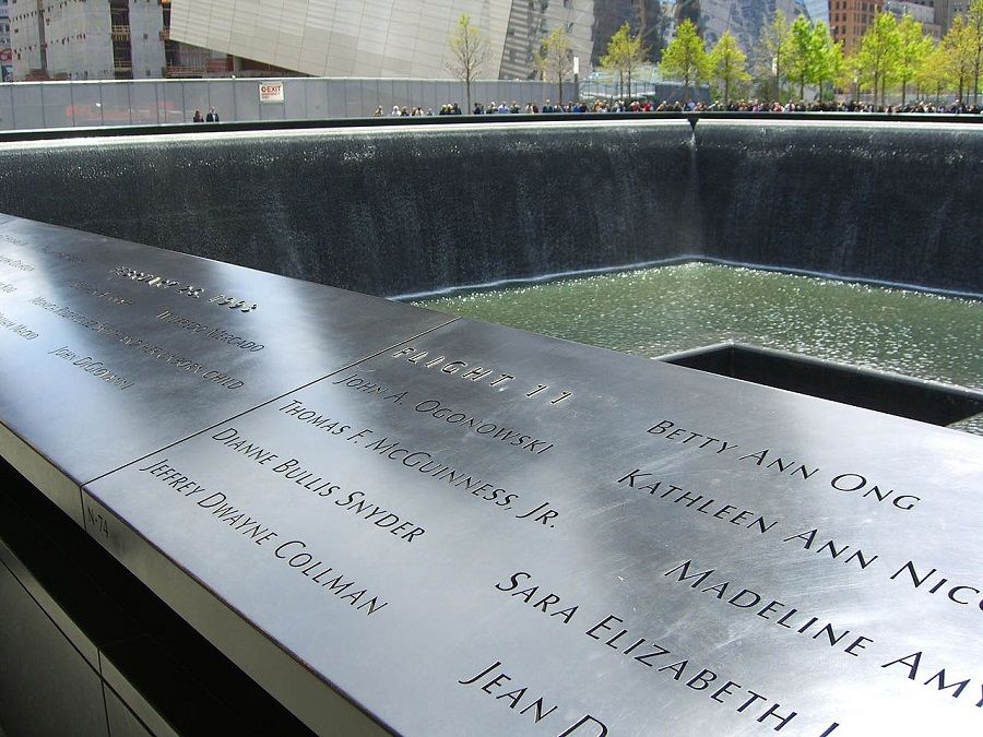 The names of passengers and crew of American Airlines Flight 11 are seen on Panel N-74 of the North Pool of the National September 11 Memorial in Manhattan, as seen on April 28, 2012. Chinese American flight attendant Betty Ann Ong’s name can be seen on the top right. (Luigi Novi/Wikimedia)