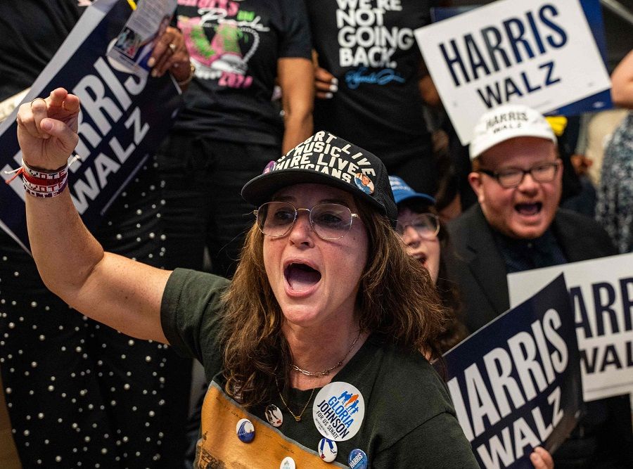 A woman reacts as supporters of Vice-President and Democratic presidential candidate Kamala Harris attend a watch party during the US Presidential debate between Harris and former US President and Republican presidential candidate Donald Trump in Nashville, Tennessee, US, on 10 September 2024. (Seth Herald/AFP)