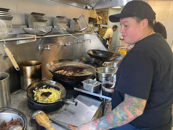 El Calenton Chino Chef and Owner Lai Ching Fong learned how to cook with a wok and an open flame at age 12.
