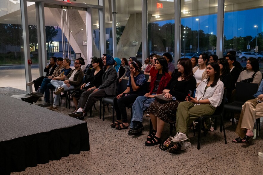 Inside the Crow Museum at UTD, an audience watches a screening of three short films by AAPI Texan filmmakers.