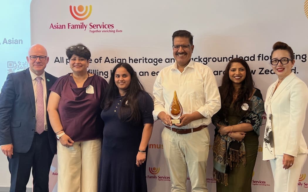 Muskaan Care Trust and Matt Doocey (left) and Kelly Feng from the Asian Family Services at the inaugural Flourishing Asian Communities and Workforce Symposium hosted by the Asian Family Services in Auckland on Friday, 13 March, 2026.