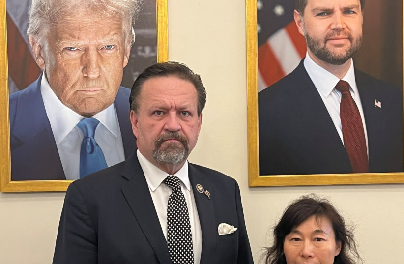 Dr. Yufang Rong, the wife of Dr. Youlin Chen, an American seismologist held for nearly two years by China, stands with Sebastian Gorka, deputy national security advisor to US President Donald Trump, in this undated photograph provided on July 13, 2026.