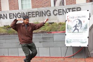 Seng Kan Cheung leading a public demonstration of taiji, qigong, and acupuncture in Anderson Courtyard in fall 2026