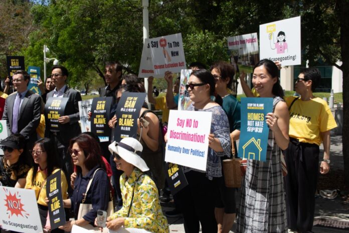 Stop AAPI Hate (Nick Gee and Shanti Elise Prasad) with Bethany Li of AALDEF and community members. 