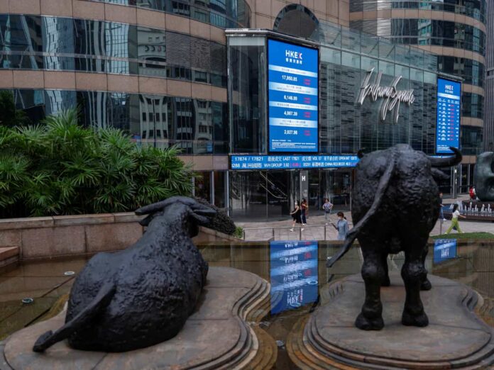 Asian Markets News: Stocks surge on tech boost; yen extends gains to cap wild week