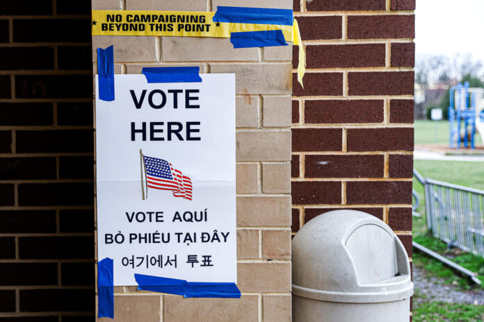 Asian American voters leaning toward Biden, though support has declined, survey finds