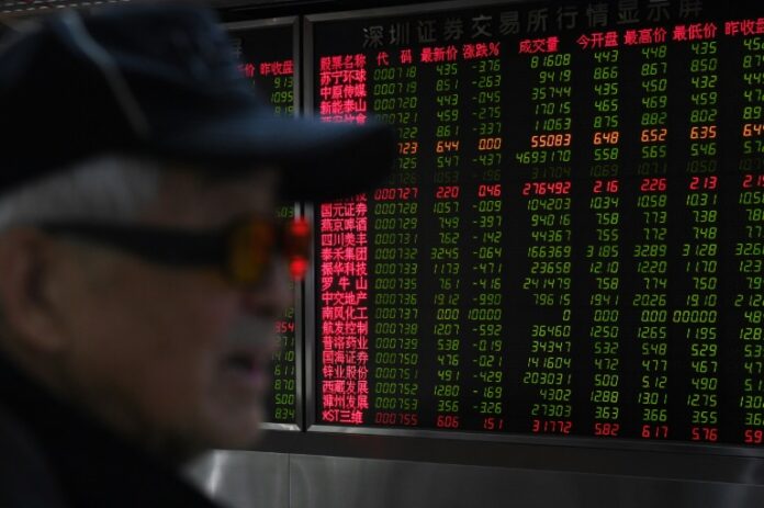 Asian markets fell with Wall Street as traders fret over this year