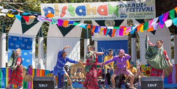 A cultural group takes the stage at the Pistahan Festival in San Francisco