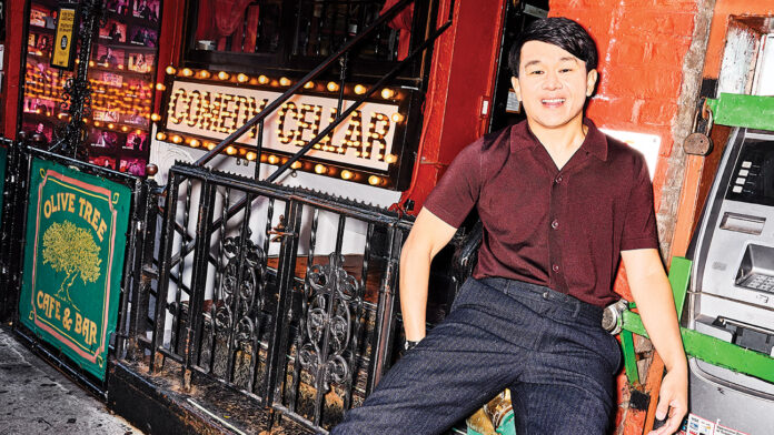 Ronny Chieng, sporting his own line of socks, was photographed Oct. 21 outside The Comedy Cellar in New York. He’s a regular at the venue, often doing five shows a night across New York City after Daily Show tapings.