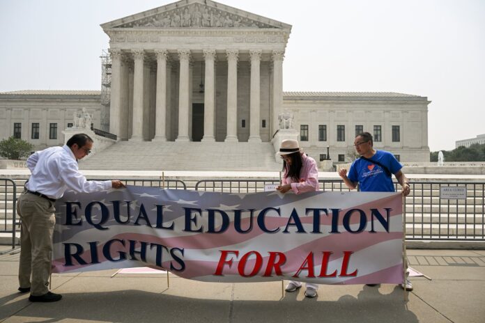 Activists from Students for Fair Admissions celebrate the affirmative action opinion outside the Supreme Court in Washington on June 29, 2023.