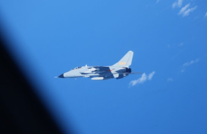 Chinese Jet Flies Over East China Sea 