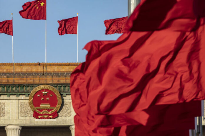 China Stops US Commerce Employee From Leaving, Reports Say